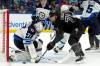 Chris O’Meara / The Associated Press
Tampa Bay Lightning center Anthony Cirelli tries to push the puck past Winnipeg Jets goaltender Connor Hellebuyck during the second period Saturday, in Tampa. The Jets have been outscored 16-5 on their current three-game road trip to Tampa, Florida and New York.
