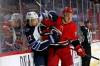 Carolina Hurricanes’ Brady Skjei checks Winnipeg Jets’ Mason Appleton into the boards during the first period in Raleigh, N.C., Thursday. (AP Photo/Karl B DeBlaker)