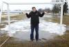 Winnipeg Youth Soccer Association director Scott Dixon on saturated field at South Winnipeg Community Centre. (Ruth Bonneville / Winnipeg Free Press)