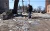 Take Pride Winnipeg executive director Tom Ethans walks among a line of trash on the corner of Charles Street and Selkirk Avenue. The annual litter index shows an increase in the number of streets covered in garbage. (Tyler Searle / Winnipeg Free Press)