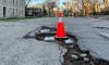 Potholes in Wolseley in May (Brent Bellamy photo)
Brent Bellamy photo 
The inability to maintain streets properly is the result of low-density suburban growth patterns that require expensive new infrastructure on the edges of the city.