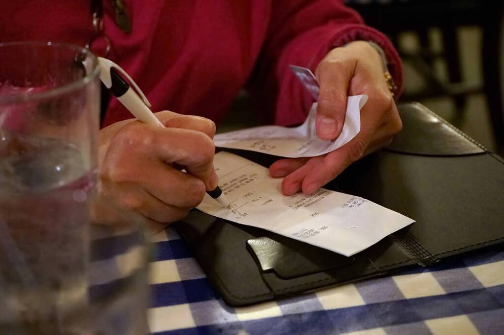 Dreamstime/TNS
Cornell’s Dr. William Michael Lynn believes consumers today have four general motivations to tip: “to reward good service, to help the server out, to get better service in the future, and to show off.”