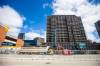 A surface parking lot at St. Mary Avenue and Donald Street is being torn up to make way for the construction of a building with residential units and commercial space. (Mikaela MacKenzie / Winnipeg Free Press)