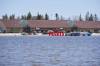 DAVID LIPNOWSKI / THE CANADIAN PRESS
Flooding is shown in Peguis First Nation, Man. Workers started raising dikes and reinforcing Tiger Dams — water-filled tubes which act as a flood barrier — Sunday night.