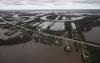 JOHN WOODS / THE CANADIAN PRESS
St. Mary’s Road between Winnipeg and St Adolphe is closed due to Red River flooding Sunday. Between 10 and 15 millimetres of rain could hit central Manitoba Tuesday night, said Environment Canada meteorologist Eric Dykes.