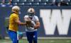 Winnipeg Blue Bombers quarterback Zach Collaros fakes the hand-off to Brady Oliveira during practice Monday. (John Woods / Winnipeg Free Press)
