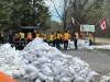 Provincial employees showed up in the dozens to build and reinforce dikes around flood-hit Nutimik Lodge, located at Nutimik Lake in Whiteshell Provincial Park. (Allison Baker-Thiessen Photo)