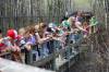 MIKAELA MACKENZIE / WINNIPEG FREE PRESS 
A school group of children aged kindergarten to grade three from Winnipeg Beach crowd up against the rail and point out snakes at the Narcisse snake dens on Wednesday, May 25, 2022.