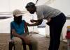 A COVID-19 vaccine is administered in Soweto, South Africa, on Nov. 29. (Denis Farrell / The Associated Press)