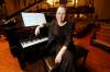 Naomi Woo, the WSO’s assistant conductor, relaxes after a rehearsal at Westminster United Church. (John Woods / Winnipeg Free Press)