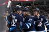 THE CANADIAN PRESS/Fred Greenslade
Winnipeg Jets' Patrik Laine celebrates his goal against the Detroit Red Wings with his linemates during second period action on Tuesday.
