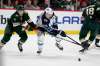 Winnipeg Jets center Mark Scheifele (55) and Minnesota Wild Nico Sturm (7) battle for the puck in the second period of Saturday's game in St. Paul, Minn. (Andy Clayton-King / The Associated Press)