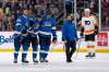 Winnipeg Jets' Mathieu Perreault (85) is helped off the ice by teammates Nathan Beaulieu (88) and Andrew Copp (9) after being injured in the second period of the Dec. 15 game against the Philadelphia Flyers. (Fred Greenslade / The Canadian Press files)