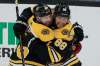 (AP Photo/Elise Amendola)
Boston Bruins right wing David Pastrnak, right, celebrates his third goal against the Winnipeg Jets with teammate David Krejci during the third period Thursday in Boston.