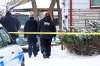 Police forensic officers investigate the city's first homicide of the year at a house on Hindley Avenue in the Worthington neighbourhood on Jan. 11. (Daniel Crump / Winnipeg Free Press)