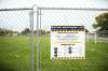 MIKAELA MACKENZIE / WINNIPEG FREE PRESS FILES
The field at Weston School in Winnipeg was fenced off in 2018 after it was found to have more than 1,000 mg/g lead levels in some areas.