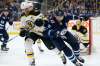 THE CANADIAN PRESS/John Woods
Winnipeg Jets' Blake Wheeler, right, and Boston Bruins' Zdeno Chara chase down a loose puck as goaltender Tuukka Rask looks on during the second period in Winnipeg on Friday.