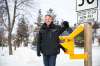 Chuck Lewis, owner of Expert Electric, decided to stop waiting for the city and installed a flashing light in a school zone on his own. (Mikaela MacKenzie / Winnipeg Free Press)