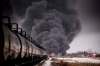 Matt Smith / The Canadian Press files
Smoke rises from last week’s derailment in Saskatchewan.