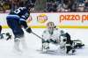 THE CANADIAN PRESS/John Woods
San Jose Sharks goaltender Aaron Dell saves a shot from Winnipeg Jets' Mark Scheifele during the second period in Winnipeg on Friday.