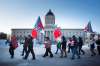 Officers representing correctional facilities across Manitoba picketed outside the provincial legislature during morning rush hour. (Mike Deal / Winnipeg Free Press)