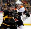 Gene J. Puskar / The Associated Press
Pittsburgh Penguins&rsquo; Sidney Crosby, left, battles for position with Philadelphia Flyers&rsquo; Nolan Patricklast season. Patrick is recovering from a migraine disorder that has kept him out of the Philadelphia lineup since training camp.