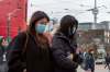 Frank Gunn / The Canadian Press Files
Pedestrians wear protective masks as they walk in Toronto on Jan. 27. As of March 3, Canada has reported 27 confirmed cases of COVID-19.