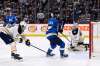 Connor taps in a Mark Scheifele rebound for his second of the night. (Fred Greenslade / The Canadian Press)