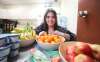 RUTH BONNEVILLE / WINNIPEG FREE PRESS
Tihiya Maheen, a Grade 10 student at Glenlawn Collegiate, gives out fruit, yogurt and other healthy snacks to fellow students.