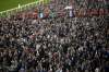 Don't stand so close to me: people in the crowd at the Cheltenham Festival in England are not practising good social distancing by being closer than a metre apart. (Tim Goode / PA)