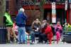 Gene J. Puskar / The Associated Press
A group of people, not practicing social distancing, gather in Market Square in downtown Pittsburgh at lunchtime, Wednesday, April 1, 2020.
