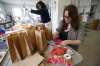 JOHN WOODS / WINNIPEG FREE PRESS
Helga Jakobson, right, and Lou Gandier prepare Crafting Kits at ArtsJunktion in Winnipeg Thursday. The pair are packing up and delivering art supplies to people in the community who want to stay creative while isolating at home.