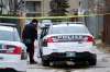 Winnipeg Police at the scene of an officer involved shooting near Pipeline Road and Adsum Drive. Stewart Andrews, 22, was shot and killed. (Daniel Crump / Winnipeg Free Press files)