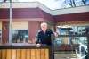 MIKAELA MACKENZIE / WINNIPEG FREE PRESS
John Kolevris, owner of Saffron's in Winnipeg, on his restaurant's patio.