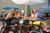 JESSE BOILY / WINNIPEG FREE PRESS  Randi Kellows, (from left) Michelle Dewson, Megan Stanick, Laura Iserloh, and Chris Foley have a drink after a bike ride at the Beer Can on Wednesday.