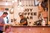 MIKAELA MACKENZIE / WINNIPEG FREE PRESS
Owner Alex Meron Gamili takes orders at the friendly neighbourhood Joy Coffee Bar.