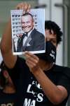 JOHN WOODS / WINNIPEG FREE PRESS FILES
An organizer holds a picture of Jason Collins as people chant and gather at the daily Justice 4 Black Lives rally outside the Winnipeg police headquarters on June 29.