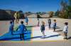 Frank MacLean, vice-principal at Linden Meadows School, with some of the blue cohort kids in Grades 1/2 on the playground Friday morning. (Mike Deal / Winnipeg Free Press)