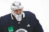 Winnipeg Jets goaltender Connor Hellebuyck (37) at practice during their NHL summer training camp when the NHL reopened during COVID-19 in Winnipeg in July. THE CANADIAN PRESS/John Woods