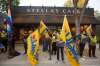 MIKE DEAL / WINNIPEG FREE PRESS Workers at the Stella’s restaurant on Sherbrook Street wave union flags as they picket in front of the restaurant early Monday morning. In a news release, UFCW Local 832 president Jeff Traeger said the dispute stems from allegations of a hostile workplace that were made in 2018. 200921 - Monday, September 21, 2020.