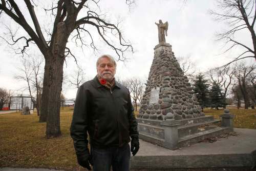 ohn Paskievich at a monument for Ukrainian soldiers killed in the Second World War; the filmmaker made A Canadian War Story over the course of three years. (John Woods / Winnipeg Free Press)