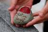 John Woods / THE CANADIAN PRESS
A painted stone is placed at the Brookside veterans cemetery in Winnipeg.