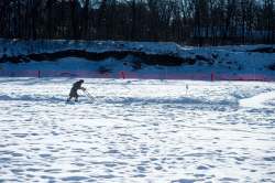 MIKE SUDOMA / WINNIPEG FREE PRESS
Bev Findlay makes her way down the ice as she clears the snow and cleans up the edges of the trail Sunday morning.