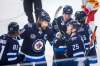 MIKAELA MACKENZIE / WINNIPEG FREE PRESS FILES Winnipeg Jets Blake Wheeler (26, centre), Patrik Laine (29), and Paul Stastny (25) celebrate their third goal against the Calgary Flames at Bell MTS Place Jan. 14, 2021.