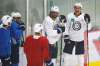 Winnipeg Jets' Adam Lowry (17) , Andrew Copp (9), Neal Pionk (4), Blake Wheeler (26) and Mark Scheifele (55) joke at practice during their NHL summer training camp as the NHL reopens during COVID-19 in Winnipeg, Tuesday, July 14, 2020. THE CANADIAN PRESS/John Woods