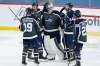 Winnipeg Jets' David Gustafsson (19), Kristian Vesalainen (93), goaltender Connor Hellebuyck (37), Derek Forbort (24) and Mason Appleton (22) celebrate a win over the Calgary Flames in NHL action in Winnipeg on Thursday. THE CANADIAN PRESS/John Woods
