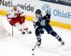 Columbus Blue Jackets forward Patrik Laine, right, controls the puck in front of Carolina Hurricanes forward Jordan Staal during the first period of an NHL hockey game in Columbus, Ohio, Sunday. (AP Photo/Paul Vernon)