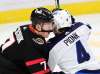 Ottawa Senators left wing Brady Tkachuk (7) and Winnipeg Jets defenceman Neal Pionk (4) battle in front of the net during second period NHL action in Ottawa on Tuesday, Jan. 19, 2021. THE CANADIAN PRESS/Sean Kilpatrick