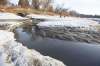 MIKE DEAL / WINNIPEG FREE PRESS
The Assiniboine River east of Omand's creek flooded by runoff from the Clifton storm drain on Monday.