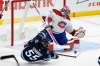 Montreal Canadiens goaltender Carey Price makes one of his 34 saves against the Winnipeg Jets as Mark Scheifele takes a tumble during the first period in Winnipeg, Monday. THE CANADIAN PRESS/Fred Greenslade